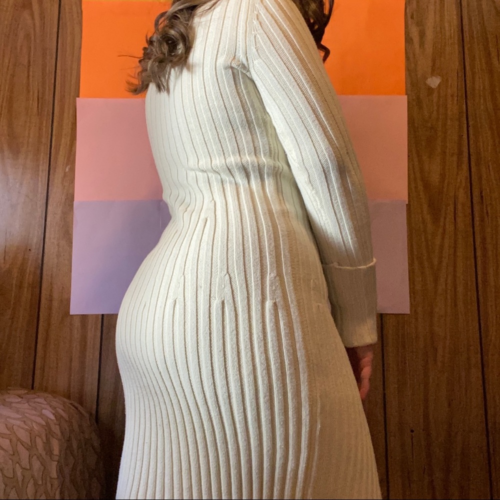 Cream turtleneck dress.